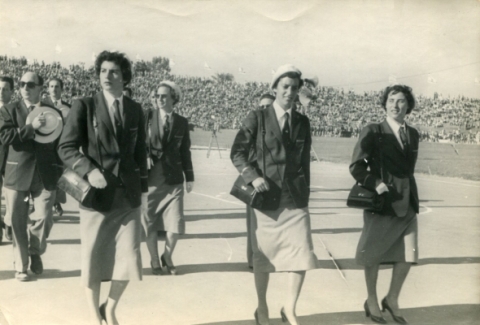 De-Jong-Duldig_-Australian-Team-saluting-the-Ben-Gurion-at-the-Opening-of-the--5th-Maccabiah-1957.-L-r.-Judy-Kellerman-Louise-Goulburn-Eva-Duldig